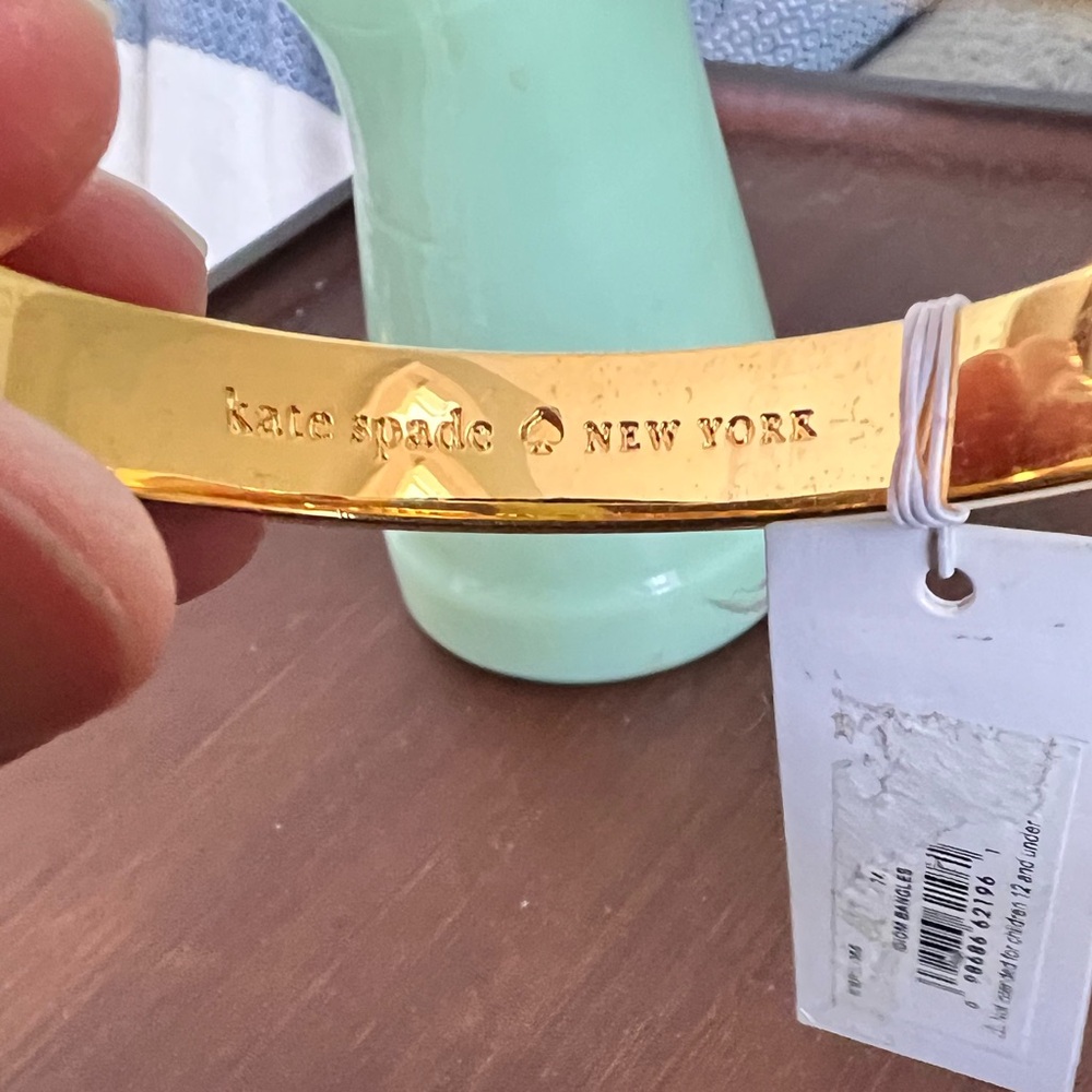 Kate Spade New York gold tone hinged bangle. “Blessing in Disguise” inside. - Picture 5 of 11